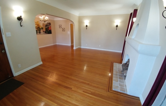 Gorgeous and Spacious 3-Bedroom 2-Bath home with Built-In BBQ, Garage, Hardwood Floors & Yard! MOVE-IN SPECIAL!! HALF OFF FIRST MONTH'S RENT!