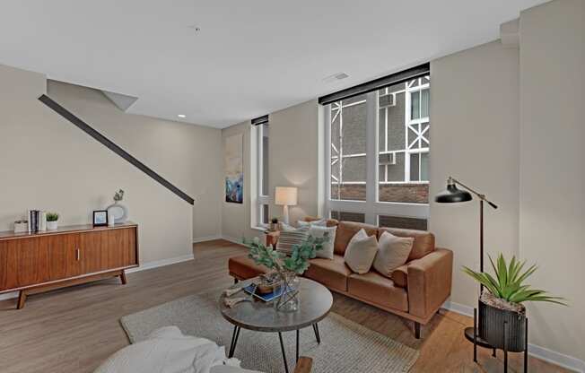 a living room with a couch and a table