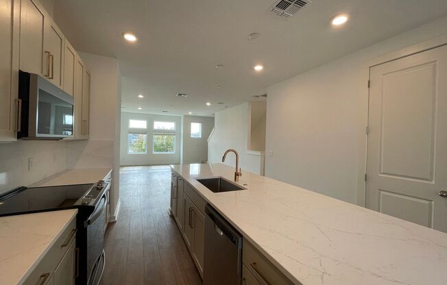 3 Bedroom, 3.5 Bath Townhome with 2 Car Garage and Water Views!