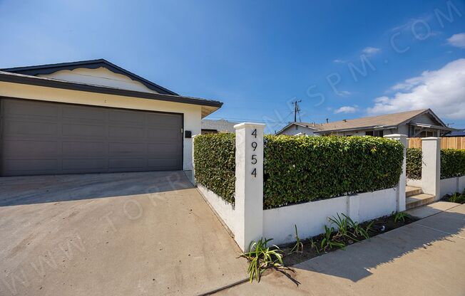 Spacious 4 Bedroom, 2 Bath Home with Private Yard and 2 Car Garage!