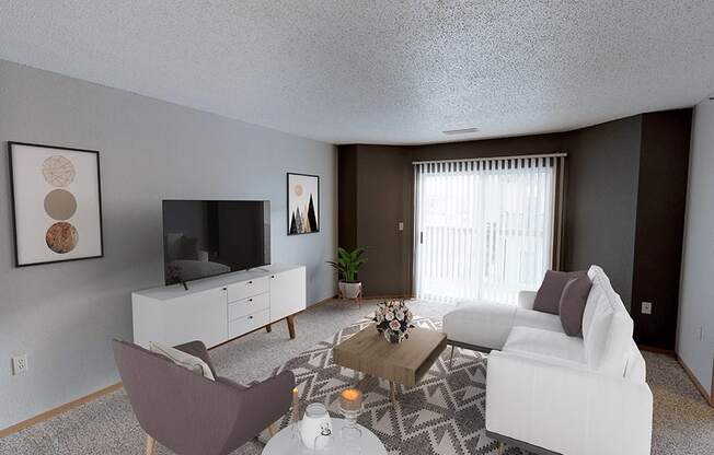 a living room with a couch and sliding glass door