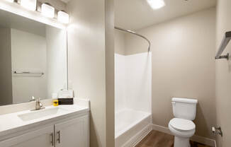 Bathroom with a tub and shower.