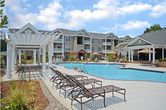 Swimming Pool with Pergola and Lounge Seating