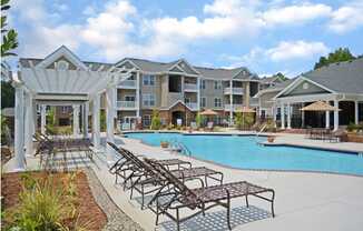 Swimming Pool with Pergola and Lounge Seating