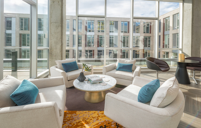 Enjoy the sun inside with floor to ceiling windows in the resident lounge