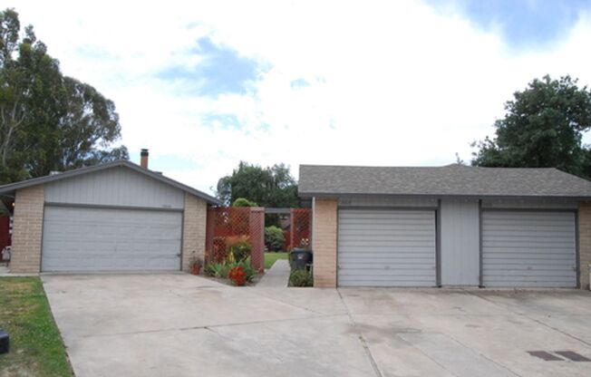 Two Bedroom Triplex with One Bathroom and Garage