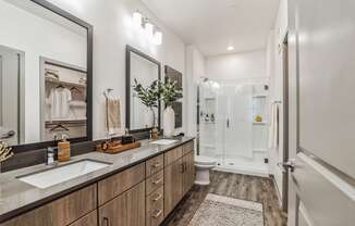 a bathroom with two sinks and a shower at Canter, Ocala, Florida