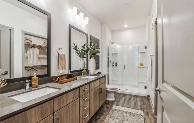 a bathroom with two sinks and a shower at Canter, Ocala, Florida
