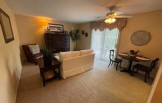 a living room with a couch and a table