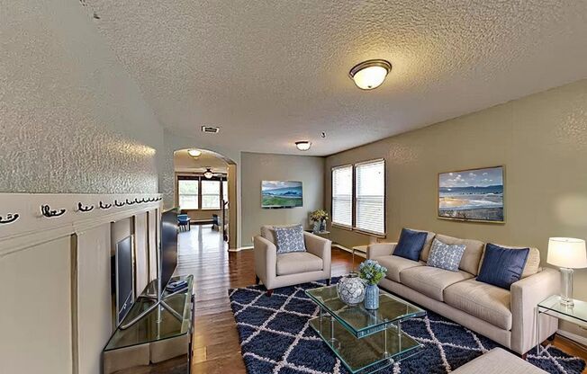OPEN FLOOR PLAN  |  2 LIVING AREAS  |  4 BEDROOMS  |  2.5 BATHS