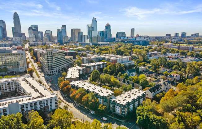 Flatiron West Trade Apartments aerial view with Charlotte skyline in background