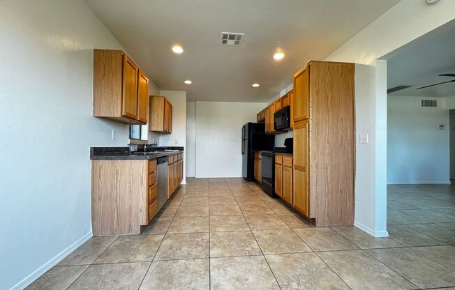 Eastside (Broadway and Wilmot) 3 bedroom, 2 bath home with large blocked yard and A/C!