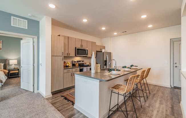 Kitchen Area With Wood-Style Flooring & Built-in Ceiling Lights