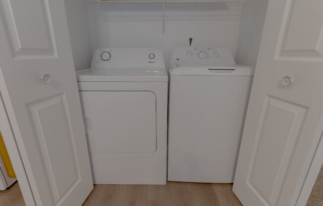 a washer and dryer in the laundry room of a home