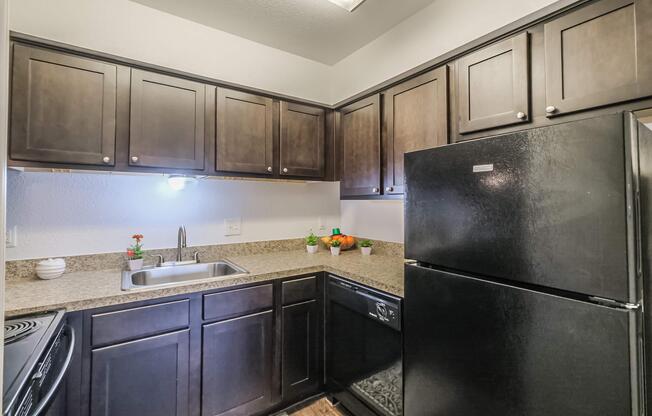 a stainless steel refrigerator in a kitchen