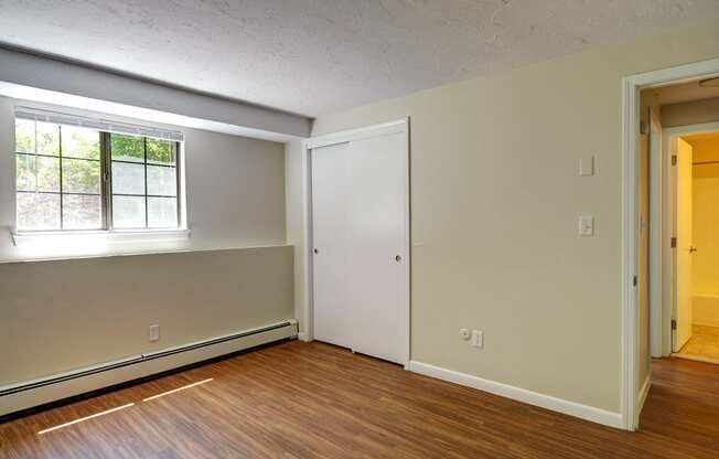 Bedroom with hardwood at Mansfield Meadows Apartments in Mansfield, MA