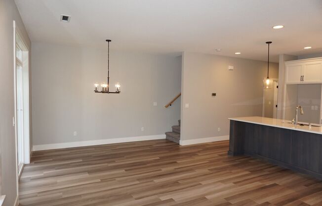 LIKE NEW Prairie Commons Luxury Townhome for Lease with EV Charging Option - 11917 NE 109th St