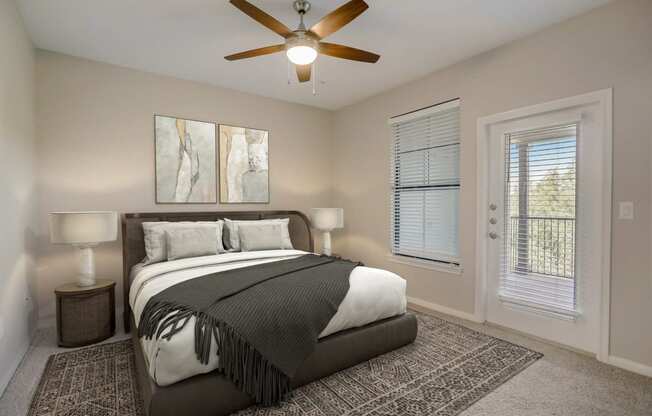 a bedroom with a bed and a ceiling fan at The Vista on Brodie, Texas, 78745