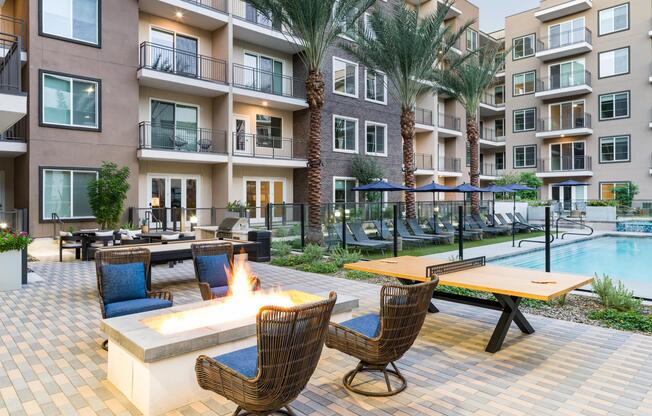 Enjoy poolside lounging, fireside seating, and a quick game of ping pong—all just steps from your apartment home at Modera Kierland.