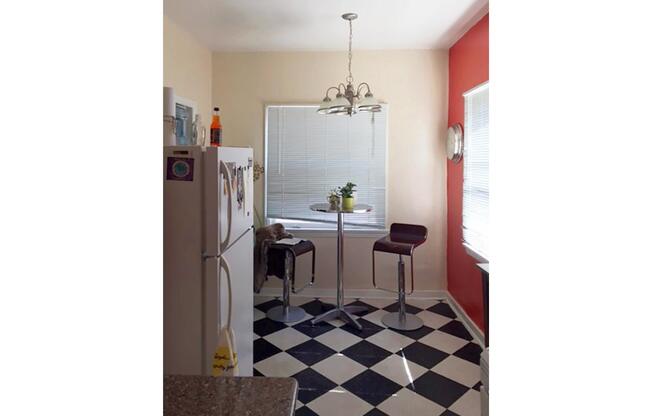 a white refrigerator freezer sitting in a room