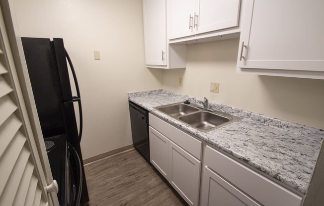 This is a photo of the kitchen in a 849 square foot 2 bedroom, 2 bath apartment at Park Lane Apartments in Cincinnati, OH.