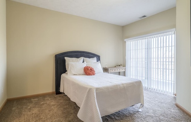 bedroom with bed and window