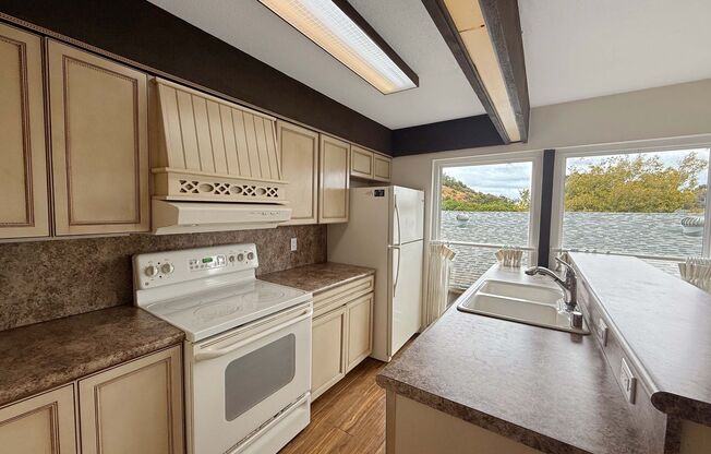 Spacious 1B/1BA Condo w/ Gated Parking & Canyon Views from Balcony!