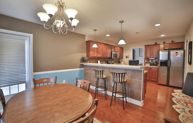 Upscale 3 to 4 BR home in The Willows at Leland. Two car garage, community pool!