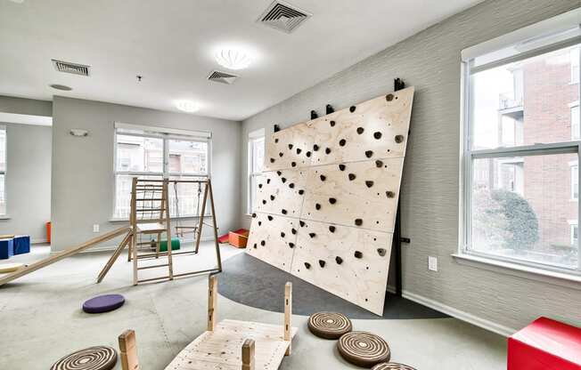 Children's playroom rock wall climbing at Liberty House by Windsor in Jersey City, NJ