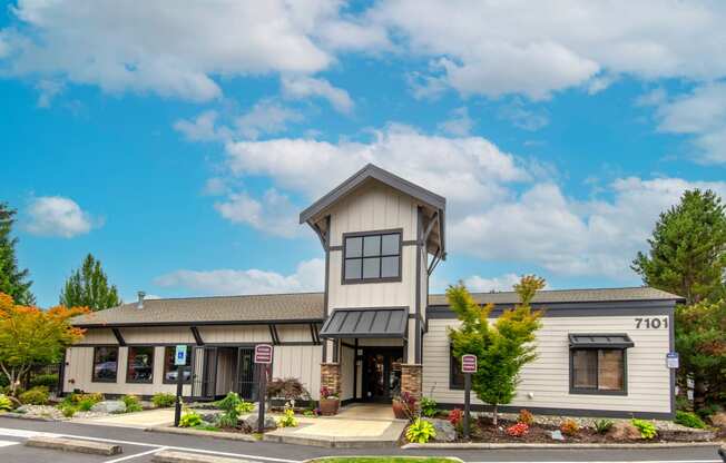 a picture of the front of the building with a blue sky in the background