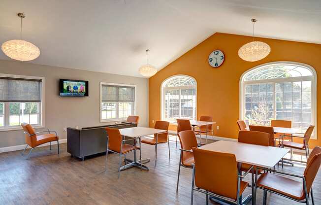 Community clubroom with TV at Mansfield Meadows Apartments in Mansfield, MA