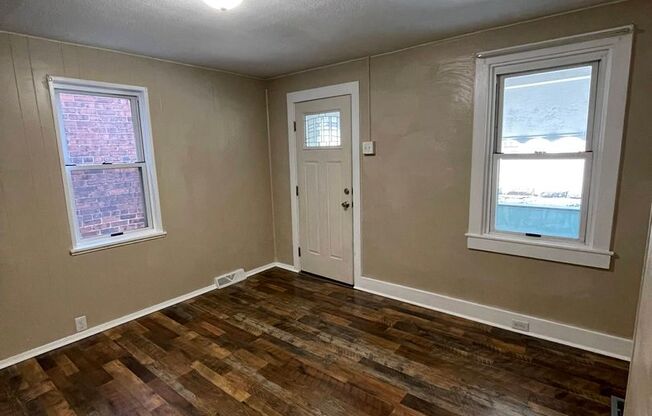 Beautifully updated 3 bed 1 bath with dishwasher and partially fenced in yard!