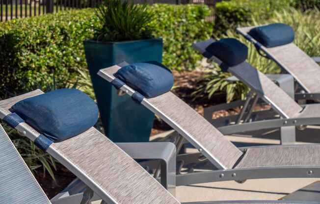 Poolside Sun loungers at Berkshire Jones Forest apartments.