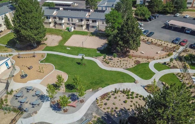 an aerial view of a park with a skate park