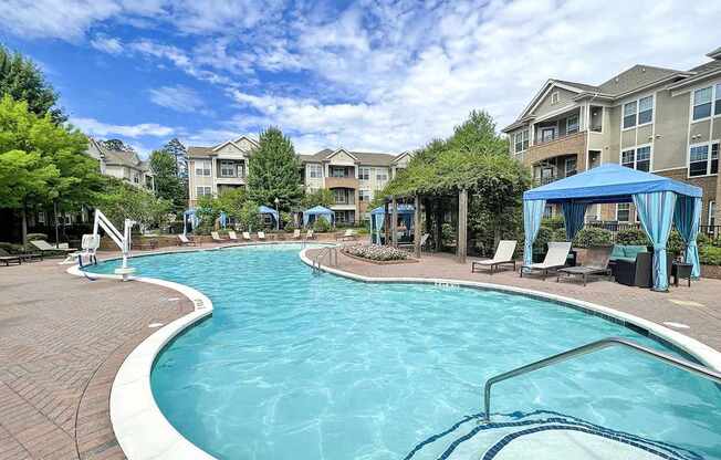 Saltwater pool with sundeck, fire pit, cabanas, WiFi, TV lounge and gas grills