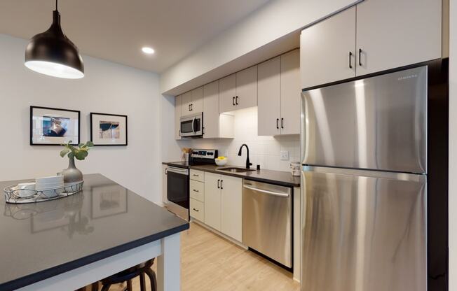 Kitchen With Dining at The Hill Apartments, Saint Paul, Minnesota