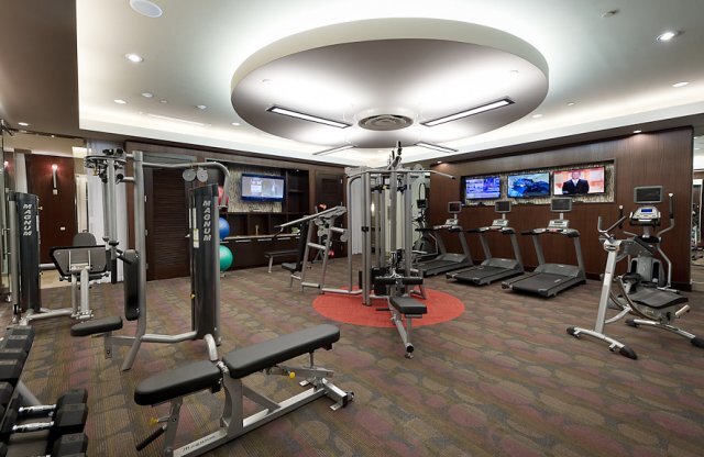 Fitness center with gym equipment at Hanover Rice Village
