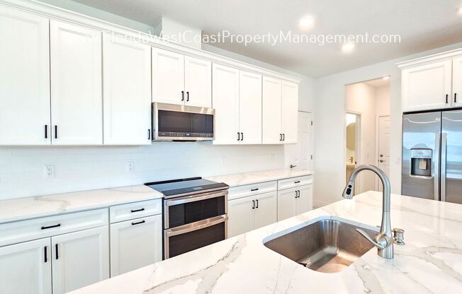 OUTSTANDING 3 BEDROOM PLUS BONUS in SIENNA PARK! BRAND NEW HOME!