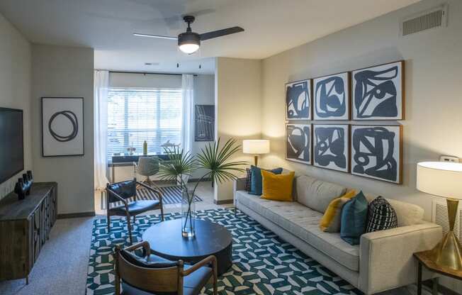 a living room with a couch and a table