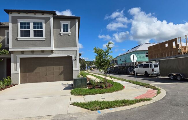 Brand New Corner Lot Townhome in New Community Located in New Tampa!