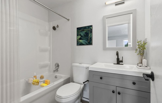 Bathroom With Bathtub at Capri Apartments, Mountlake Terrace, Washington