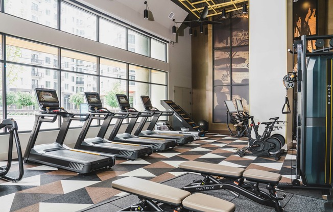 HIIT-Inspired fitness studio with TRX station and spin bikes