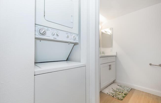 a kitchen with a sink and a refrigerator