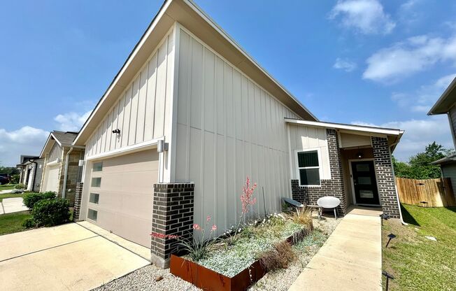 Modern and Cozy 3BR/2BA Home with Garage, Fenced Yard & Covered Deck!