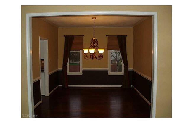 BEAUTIFUL UPDATED HOME WITH FENCED BACKYARD WITH DECK