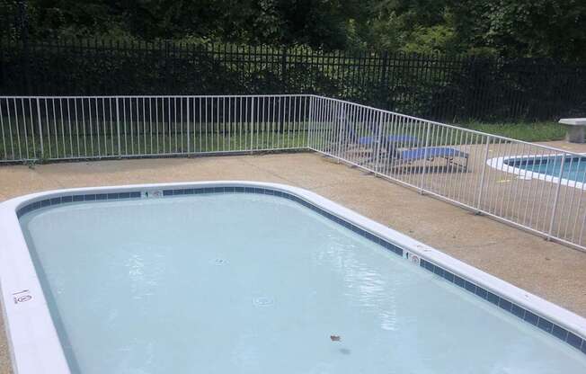 Swimming pool with a white border. at New Carrollton Woods, Riverdale, MD