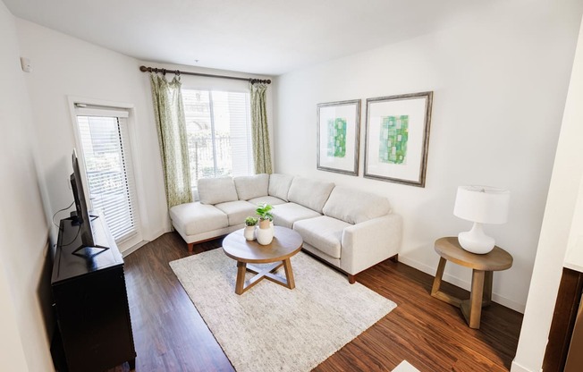a living room with a couch and a table