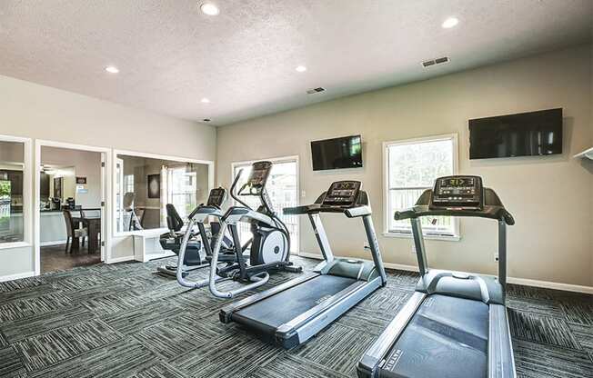 Fitness Center with cardio equipment at Chelsea Village Apartments