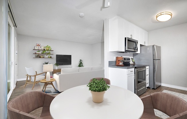 Staged dining, living room, and kitchen
