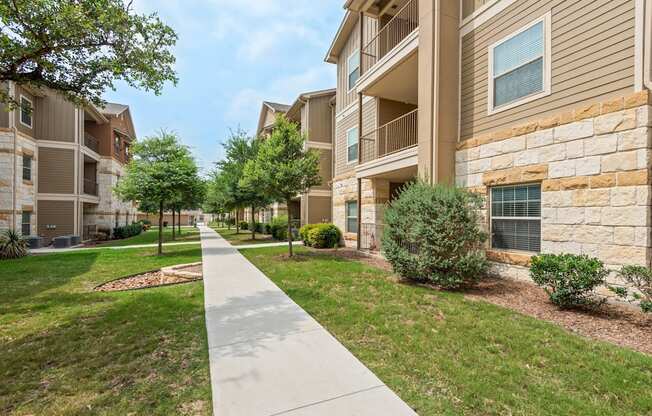 the preserve at ballantyne commons walkway between apartment buildings